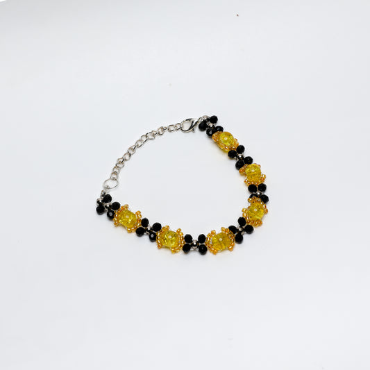 Yellow Crackle Glass and Black Beaded Bracelet